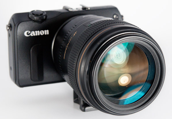 Canon EOS M met adapter en 85mm